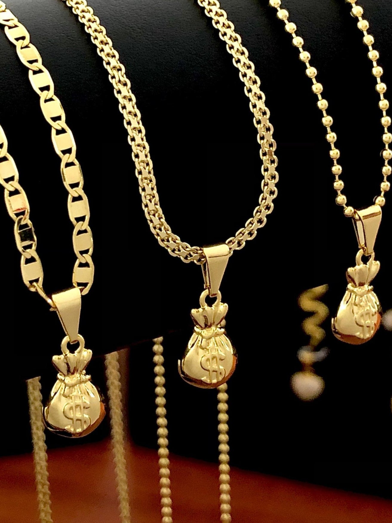 Dije Bolsa de Dinero